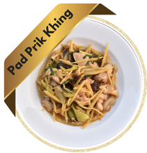 A flavorful dish of Pad Khing (Thai ginger stir-fry) featuring sliced meat stir-fried with fresh ginger, onions, mushrooms, and colorful vegetables, served hot on a plate.