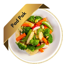 A colorful plate of Pad Pak (Thai stir-fried vegetables) featuring a mix of vibrant veggies like broccoli, carrots, baby corn, and mushrooms, all stir-fried in a oyster sauce.